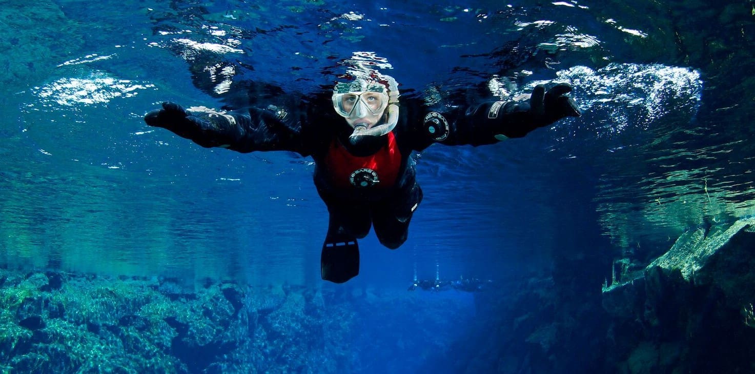 Snorkeling Silfra under the Midnight Sun